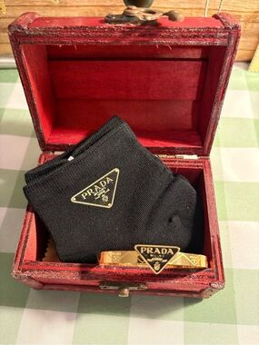 Gold-Tone Bangle & Ankle Socks Bonus:Small wooden box included.